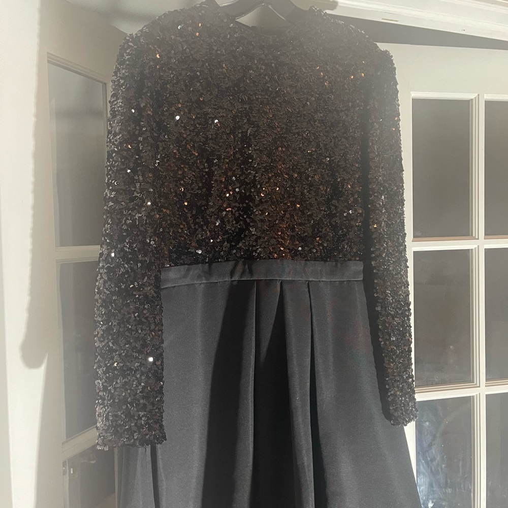 Were one time 3 or 4 hours, like new size 14 , loved it bought it at Saks